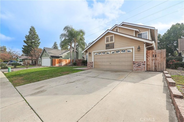 view of front of property with a garage and a front lawn