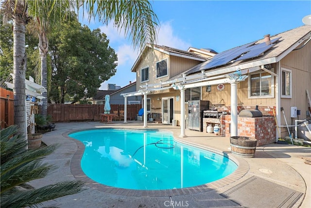 view of pool featuring a patio