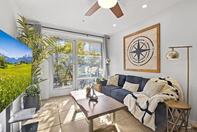 tiled living room featuring ceiling fan