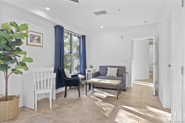 sitting room featuring light tile patterned floors