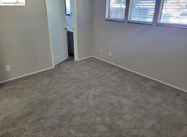 view of carpeted spare room