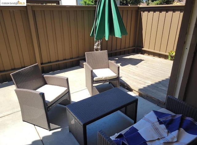 view of patio featuring a deck