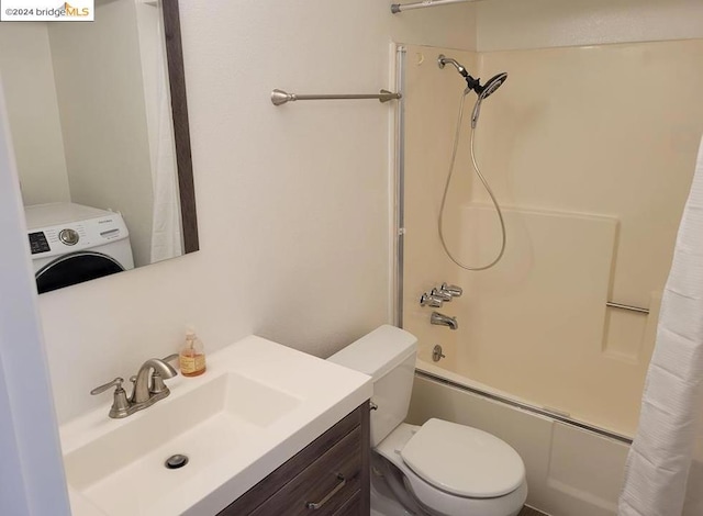 full bathroom with washer / clothes dryer, shower / tub combo with curtain, vanity, and toilet