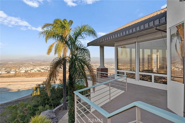 view of patio / terrace featuring a mountain view