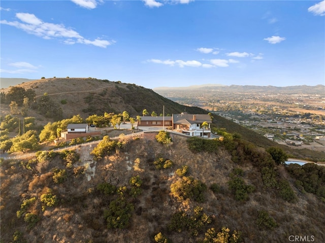 drone / aerial view featuring a mountain view