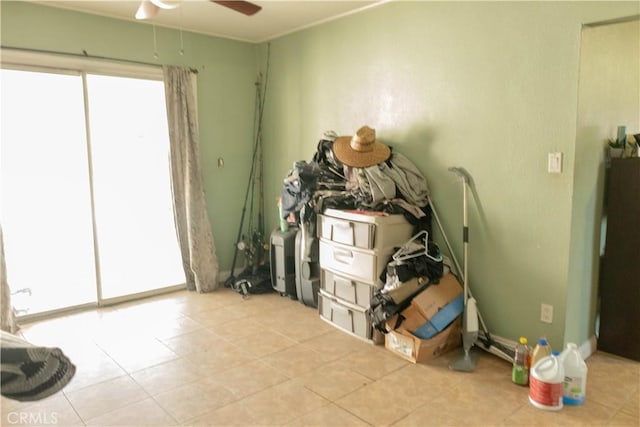 interior space featuring ceiling fan