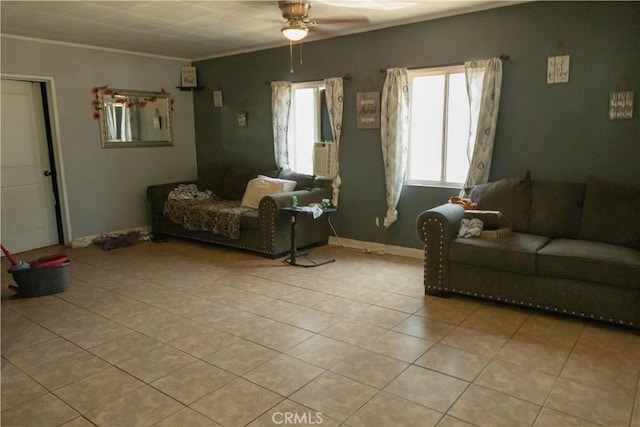 living room featuring ceiling fan and ornamental molding