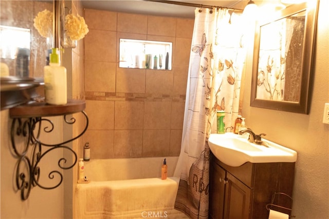 bathroom with vanity and shower / bath combo