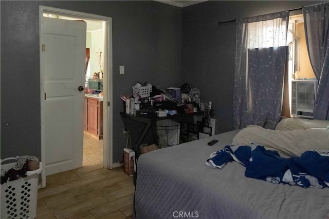 bedroom with light hardwood / wood-style floors