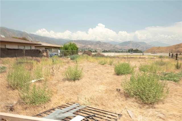 property view of mountains featuring a rural view