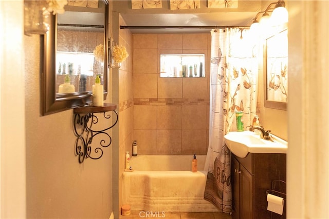 bathroom with shower / bath combination with curtain and vanity