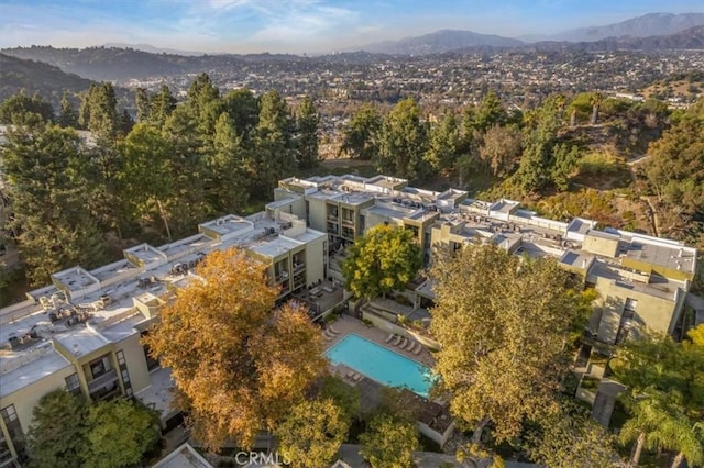 birds eye view of property featuring a mountain view