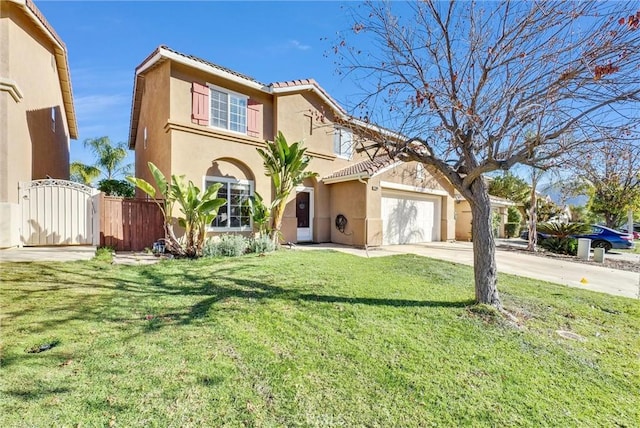 view of front of house featuring a front yard and a garage