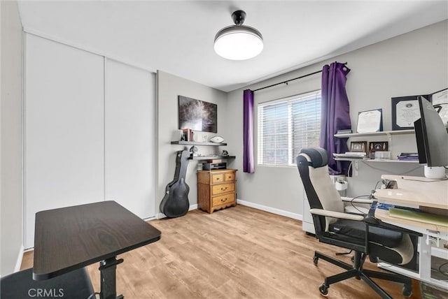 office space featuring light wood-type flooring