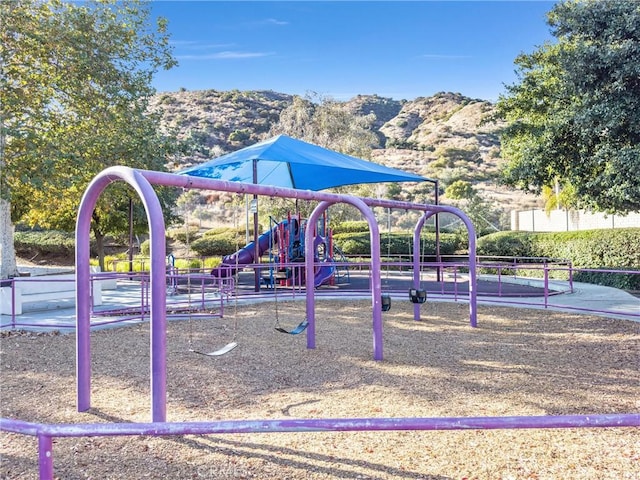 view of play area with a mountain view