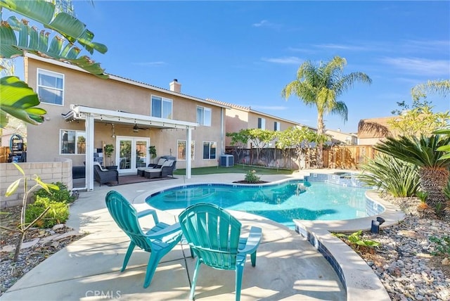 view of swimming pool with ceiling fan, french doors, a pergola, central AC, and a patio area