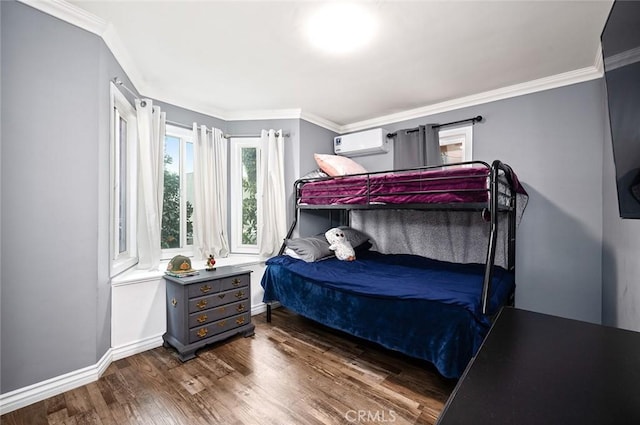 bedroom featuring dark hardwood / wood-style floors, a wall mounted AC, and ornamental molding