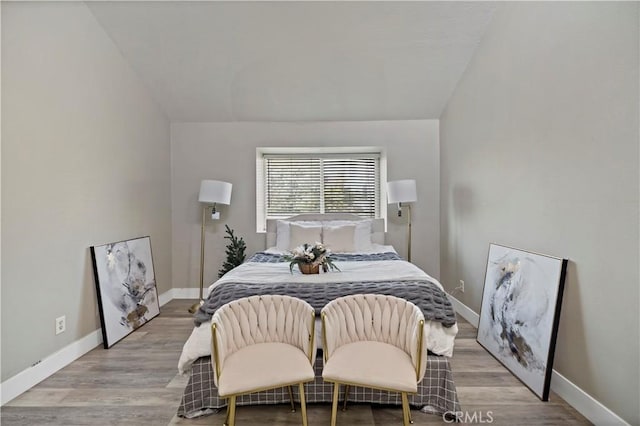 bedroom with light hardwood / wood-style flooring