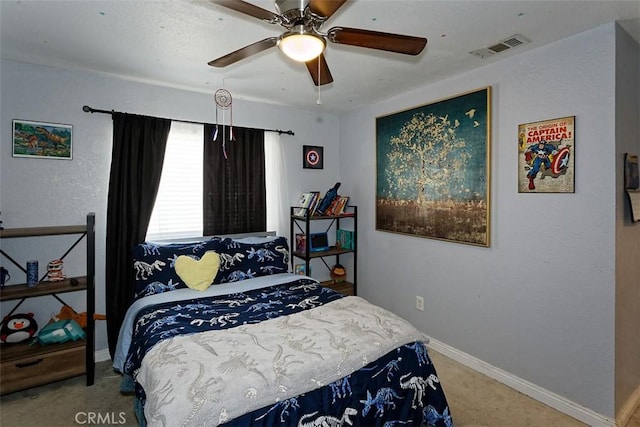 carpeted bedroom featuring ceiling fan