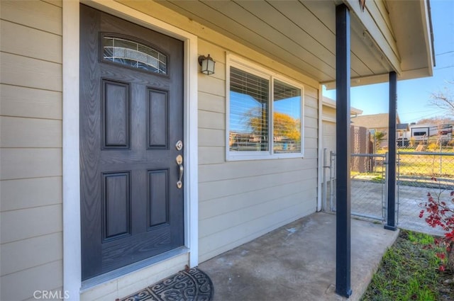 entrance to property with a porch