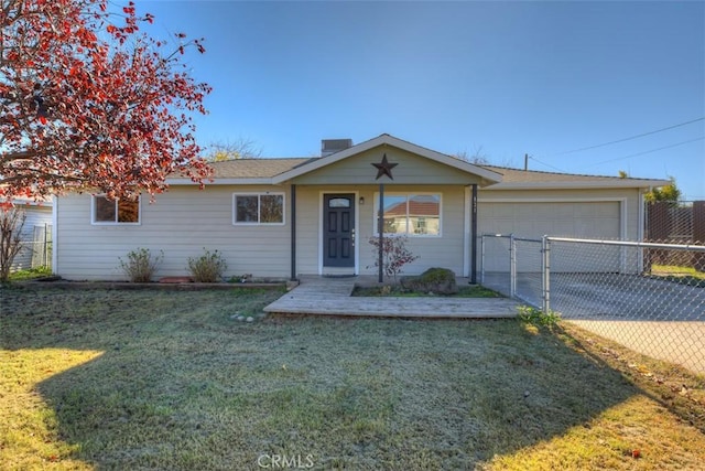 ranch-style home with a front lawn and a garage