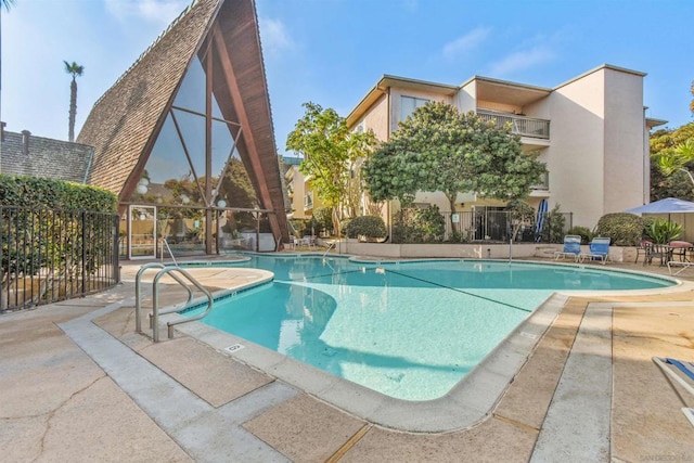 view of pool with a patio area