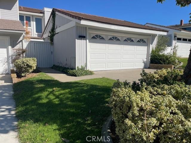 garage featuring a yard