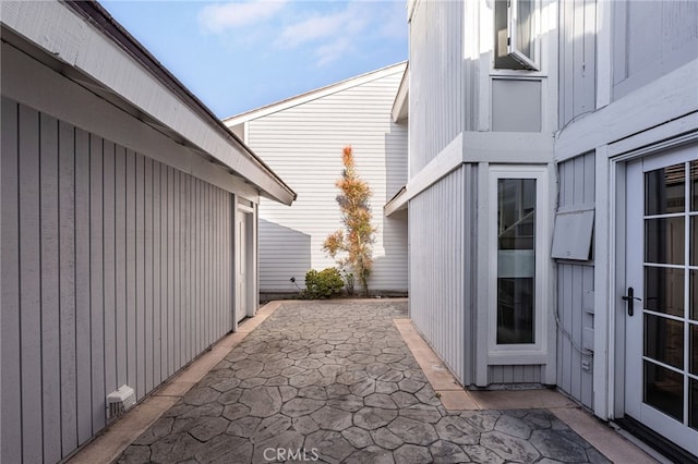 view of property exterior featuring a patio