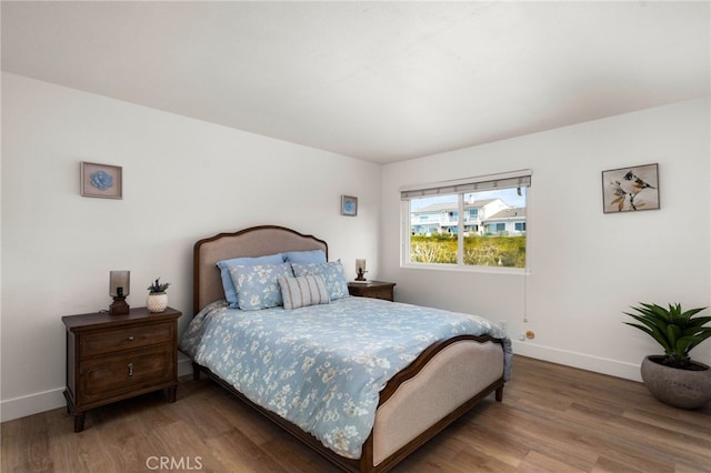 bedroom featuring hardwood / wood-style floors