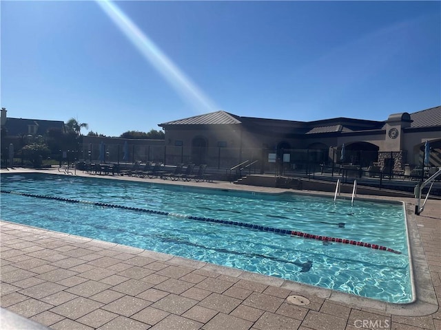 view of pool featuring a patio area