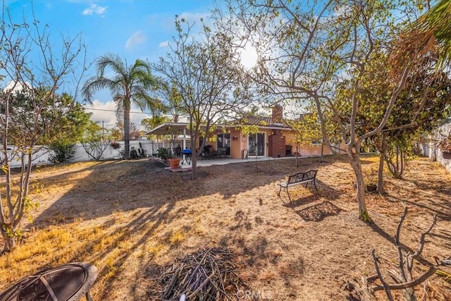 rear view of property with a patio