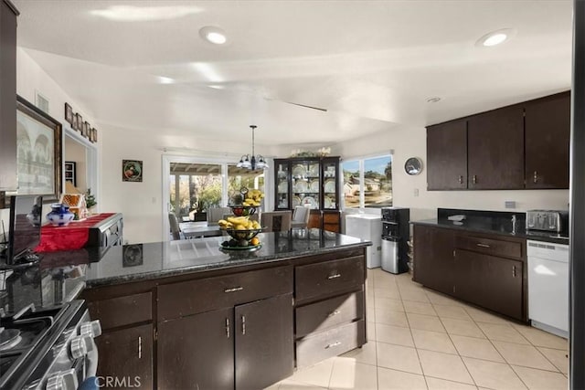 kitchen featuring dishwasher, hanging light fixtures, a notable chandelier, electric stove, and dark brown cabinets