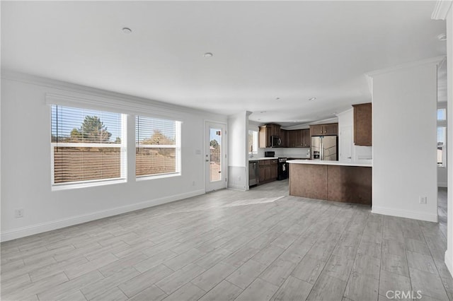 unfurnished living room featuring light hardwood / wood-style floors