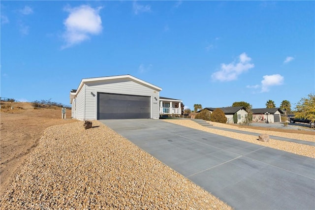 ranch-style home featuring a garage