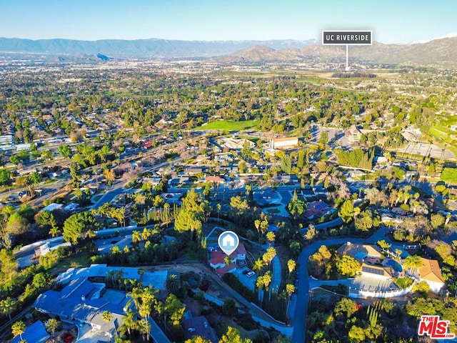 drone / aerial view featuring a mountain view