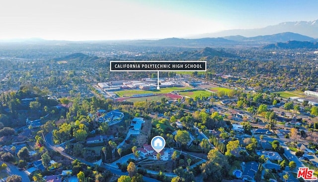 drone / aerial view featuring a mountain view