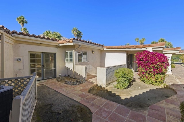 view of property exterior featuring a patio area