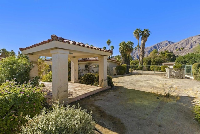 view of patio / terrace featuring a mountain view