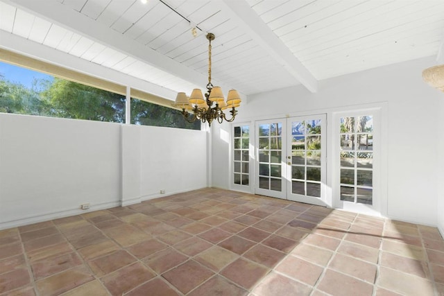 unfurnished sunroom featuring a chandelier, beam ceiling, french doors, and wood ceiling