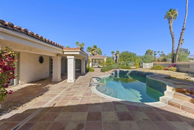 view of swimming pool featuring a patio