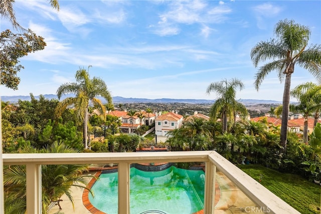 view of swimming pool featuring a mountain view