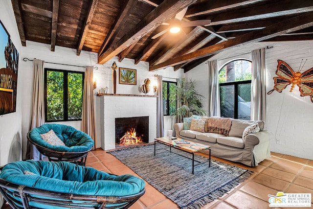 living room featuring plenty of natural light, wood ceiling, and vaulted ceiling with beams