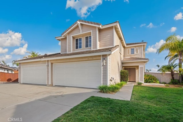 front facade featuring a garage and a front lawn