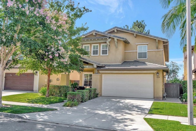 craftsman inspired home with a garage