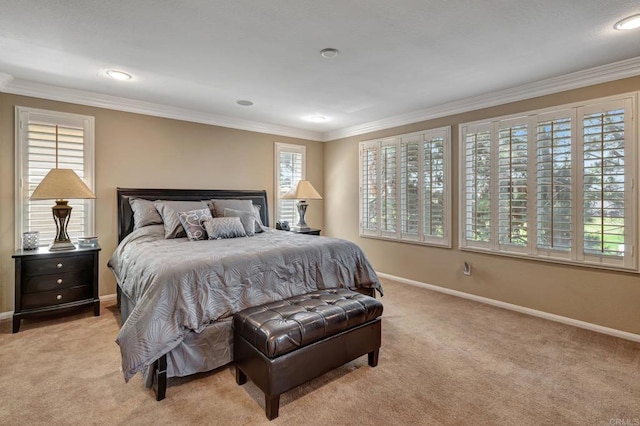 carpeted bedroom featuring crown molding