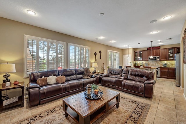 living room with light tile patterned floors