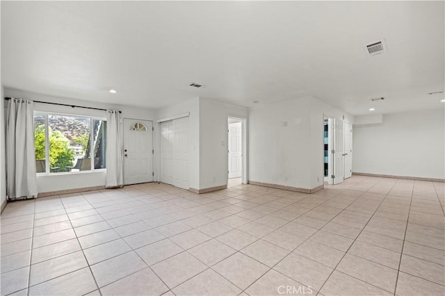 view of tiled spare room