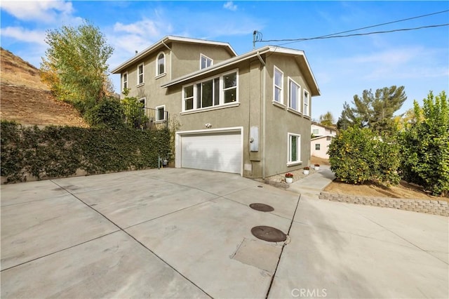 view of home's exterior with a garage