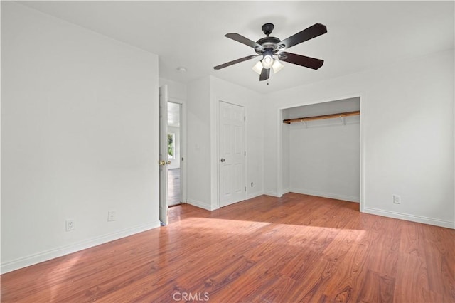 unfurnished bedroom featuring ceiling fan and light hardwood / wood-style floors