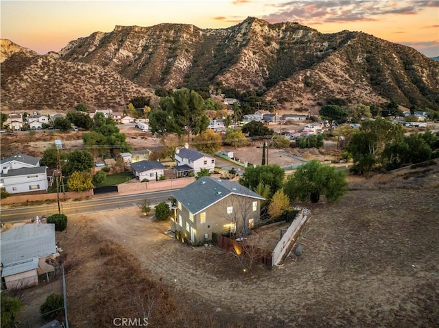 aerial view at dusk with a mountain view